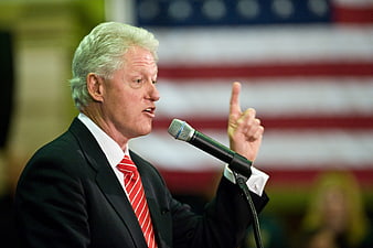 Bill Clinton Speaking at Political Rally with American Flag