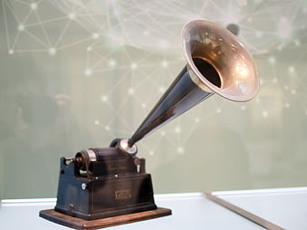 Vintage Gramophone with Brass Horn on Wooden Base
