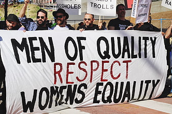 Men holding protest banner for women's equality and respect