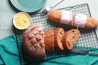 Artisan Bread Loaf and Baguette on Cooling Rack