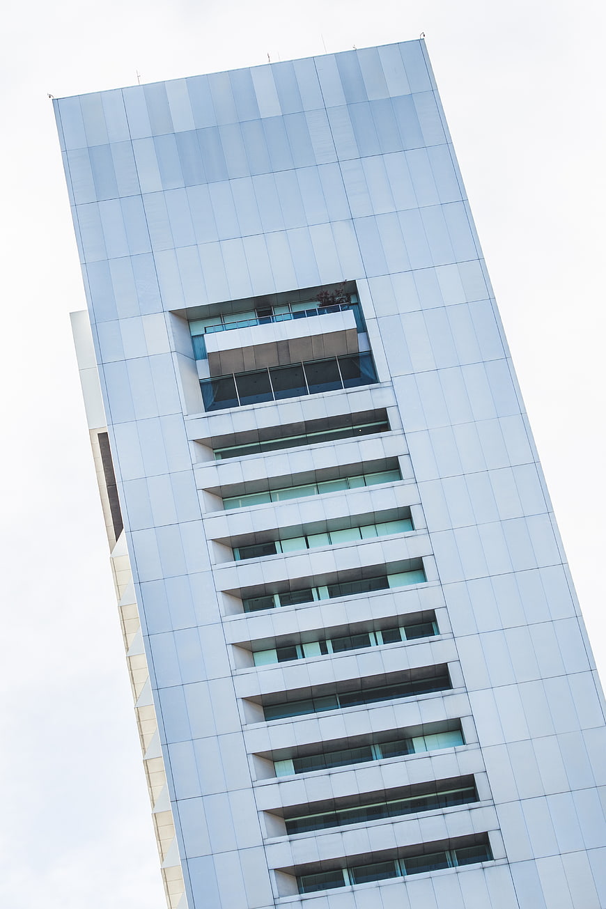 Low Angle View of Modern Glass Skyscraper