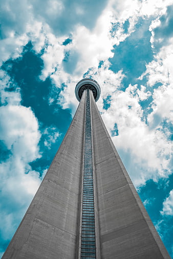 Low angle view of CN Tower against blue sky