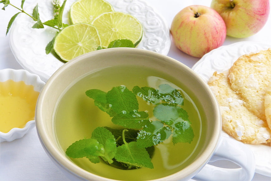 Fresh Mint Tea with Honey, Apples, and Cookies