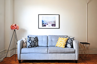Modern Living Room with Blue Sofa and Decorative Pillows