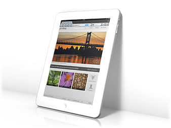 White tablet computer displaying website on white background