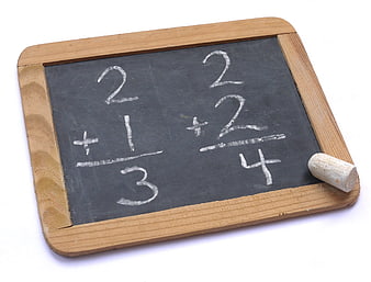 Fraction Addition Math Problem on Small Wooden Chalkboard