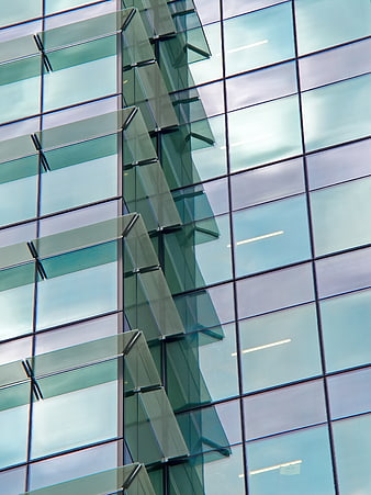 Modern Glass Office Building Facade with Geometric Pattern