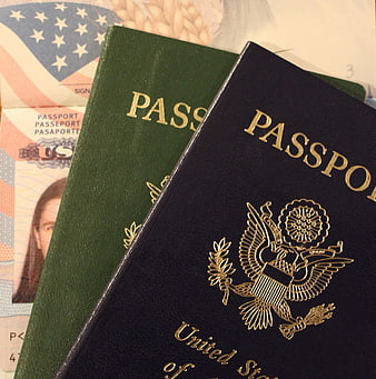 US Passport and Travel Documents on American Flag