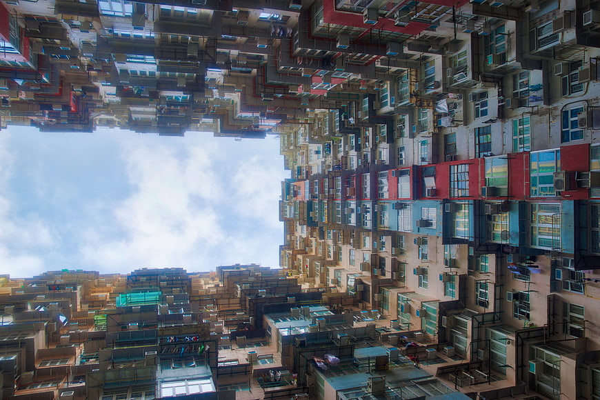 Dense Multicolored High-Rise Housing Complex In Hong Kong