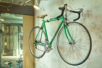 Green Giant Road Bike Mounted on Wall