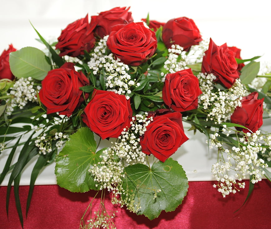 Red Rose Bouquet with Baby's Breath on Red Tablecloth