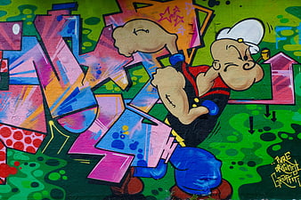 Vibrant Popeye Street Art Mural With Colorful Graffiti Lettering