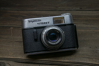 Vintage Voigtländer Vitoret Camera on Wooden Surface