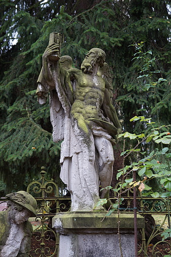 Weathered Stone Angel Statue in Old Cemetery