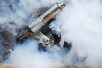 Motorcycle Burnout With Thick Tire Smoke And Chrome Exhaust