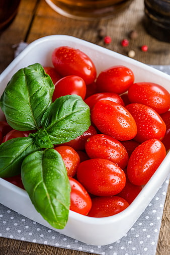 Fresh Cherry Tomatoes and Basil in White Bowl