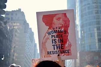Protest Sign Reading Woman's Place Is In The Resistance