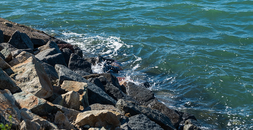 Rough Rocky Shoreline with Turquoise Ocean Waves