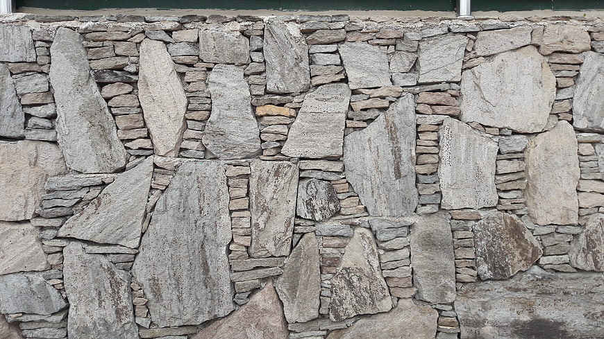 Textured Stone Wall Background with Natural Rock Patterns