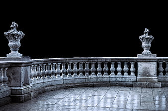 Antique Stone Balustrade With Sculpted Urns And Wet Tiled Floor