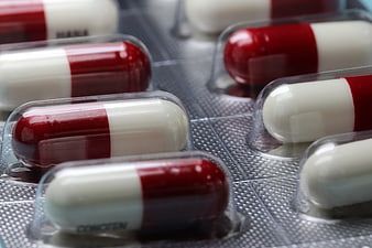 Red and White Pharmaceutical Capsules in Blister Pack