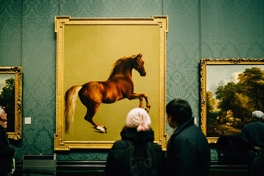 Visitors Viewing Horse Painting in Art Museum Gallery