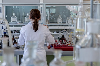 Female Chemist Working in Modern Laboratory
