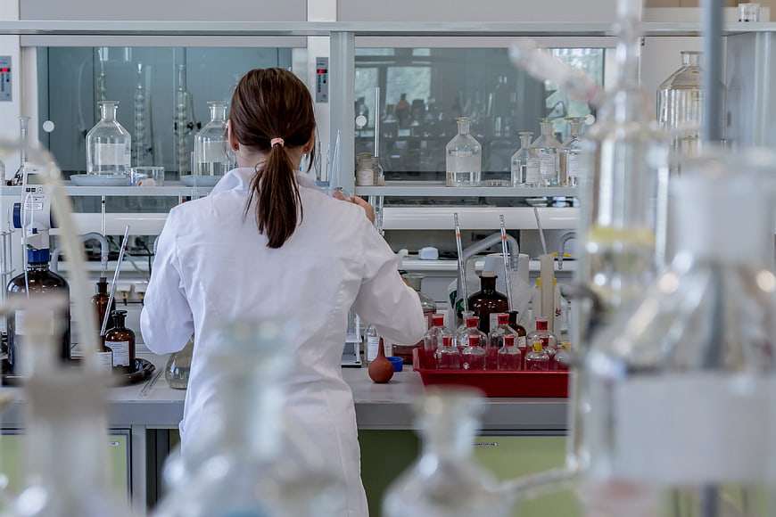 Female Chemist Working in Modern Laboratory