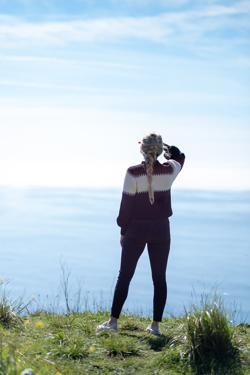 Woman with Braid Looking at Ocean View