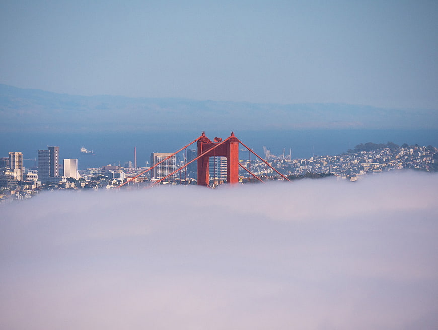 Golden Gate Bridge Rising Above Thick Fog in San Francisco