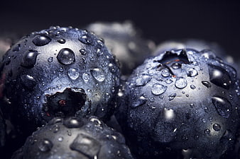 Close-up of Fresh Wet Blueberries with Water Droplets