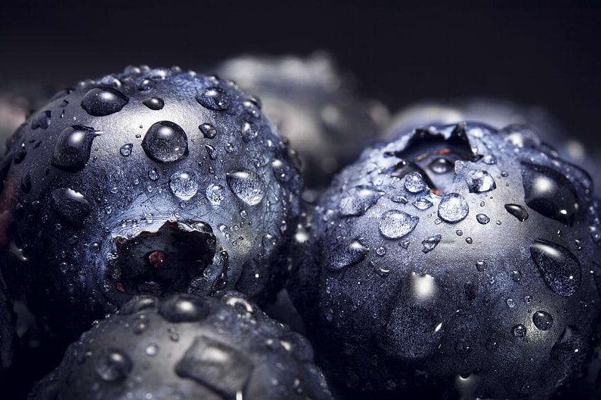 Close-up of Fresh Wet Blueberries with Water Droplets