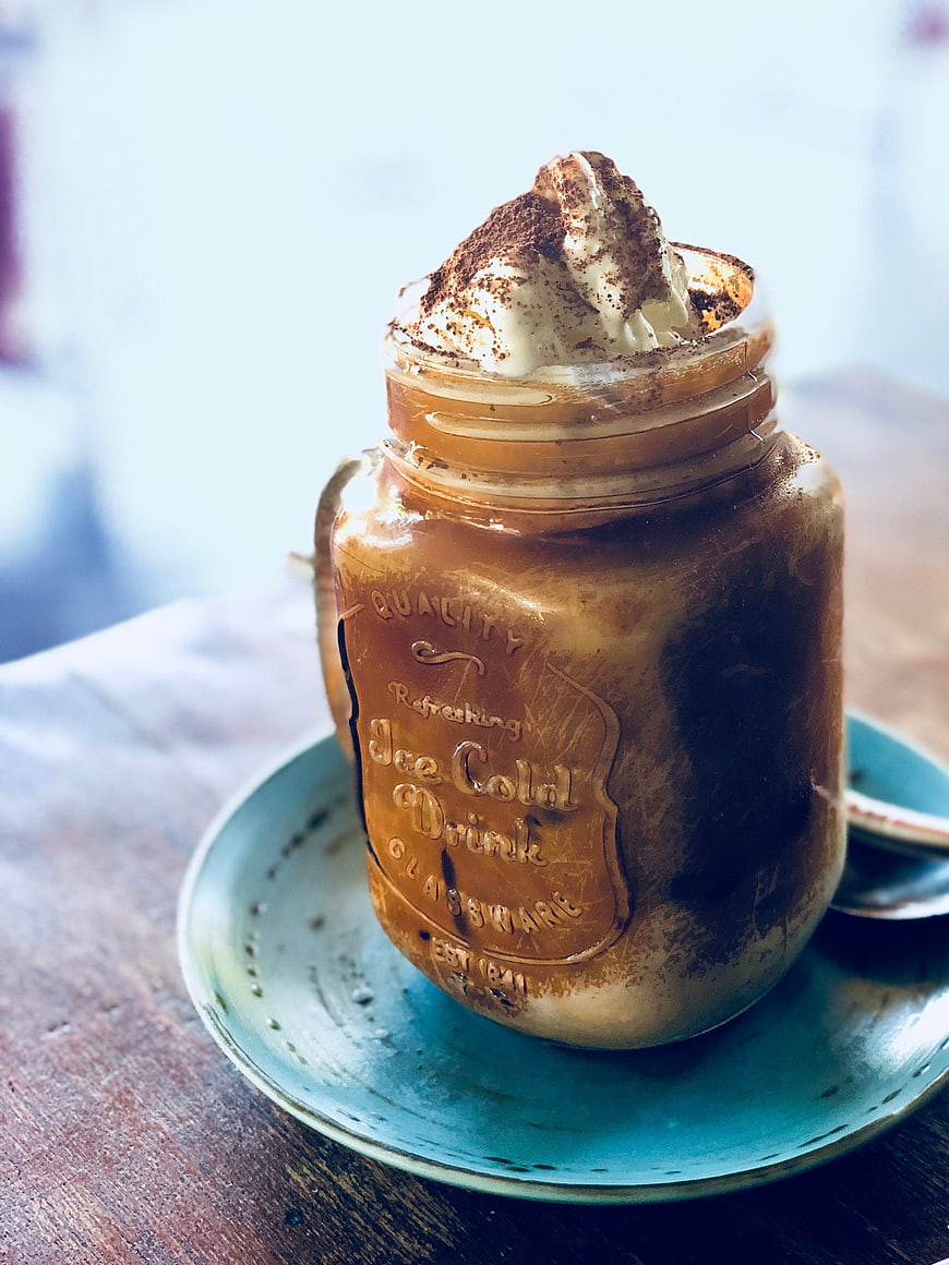 Iced Coffee in Vintage Mason Jar with Whipped Cream