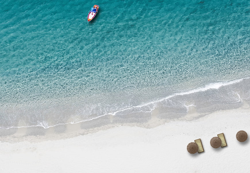 Aerial View of Turquoise Beach with Longtail Boat and Sunbeds