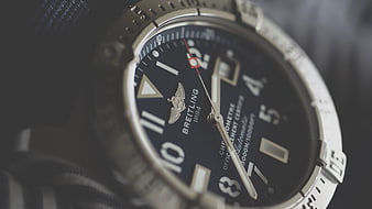 Close-up of luxury Breitling watch with blue dial