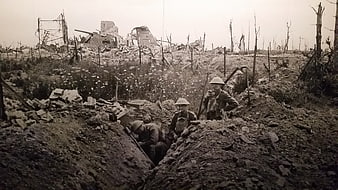 Historical WWI soldiers in a trench on a devastated battlefield