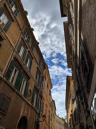 Low Angle View of Historic Venetian Buildings and Blue Sky
