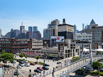 Urban Cityscape with Pedestrian Bridge and Downtown Skyline