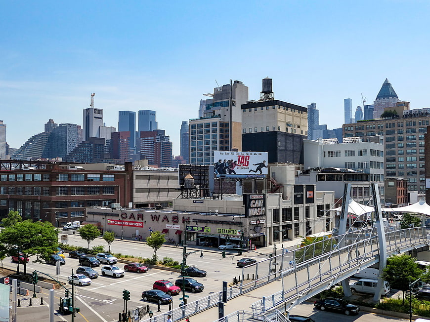 Urban Cityscape with Pedestrian Bridge and Downtown Skyline