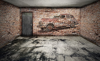 Abandoned Brick Garage Interior With Faded Car Graffiti And Concrete Floor