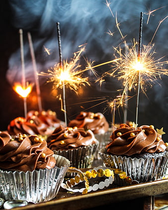 Chocolate Cupcakes with Sparklers and Gold Sprinkles