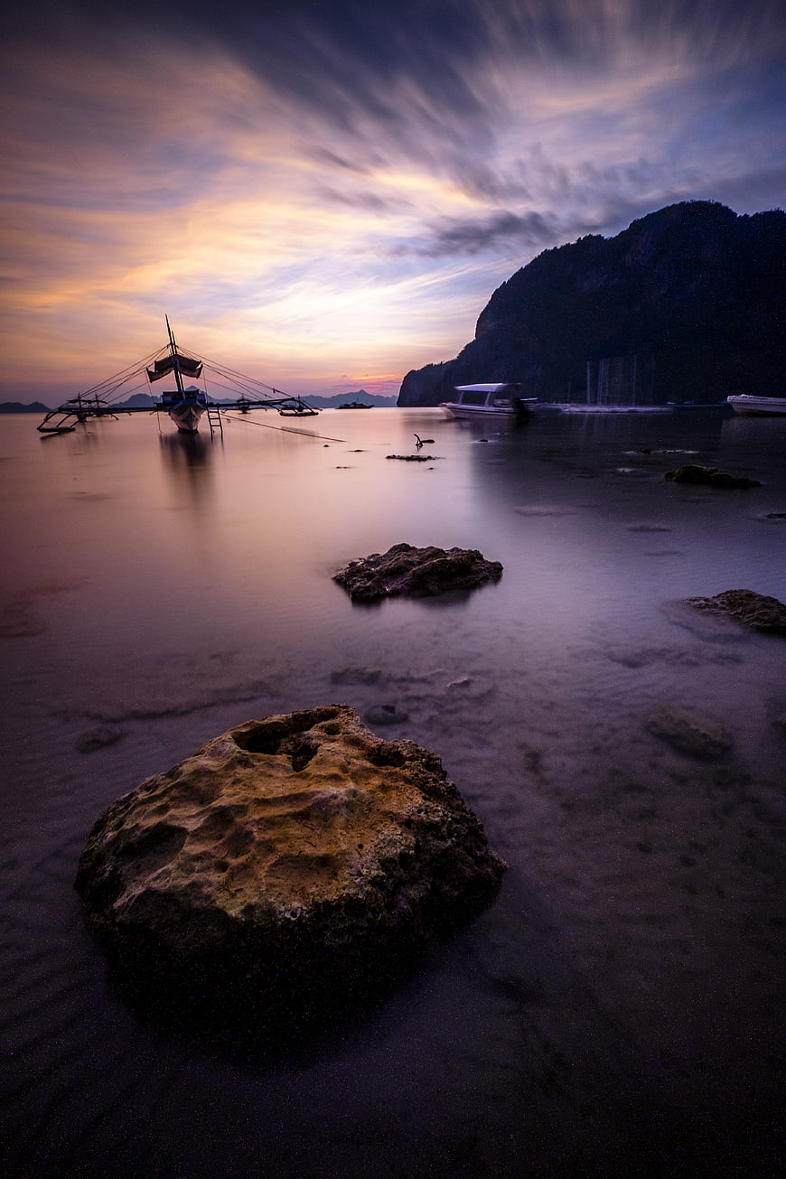 Long Exposure Sunset Seascape with Traditional Fishing Boats