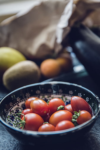 Fresh Cherry Tomatoes in Decorative Ceramic Bowl