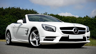 White Mercedes-Benz SL-Class Convertible Parked On Asphalt Road