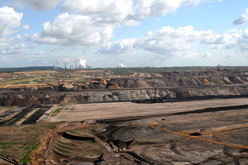 Aerial View of Open Pit Brown Coal Mine with Industrial Machinery