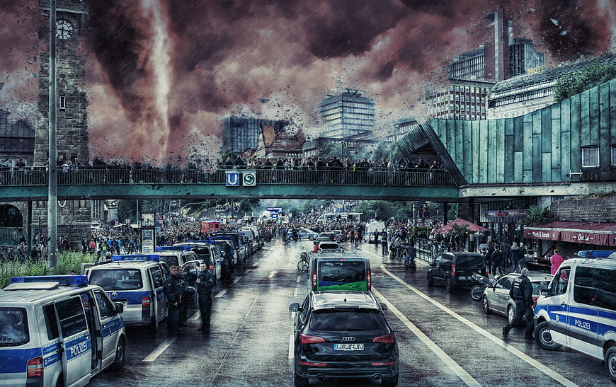 Dramatic city street scene with police cars and storm clouds
