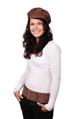 Smiling woman in brown cap and white shirt on white background