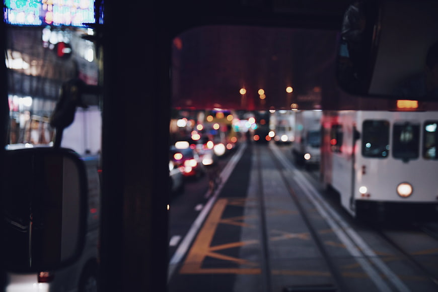Blurred Night City Traffic View from Bus Window