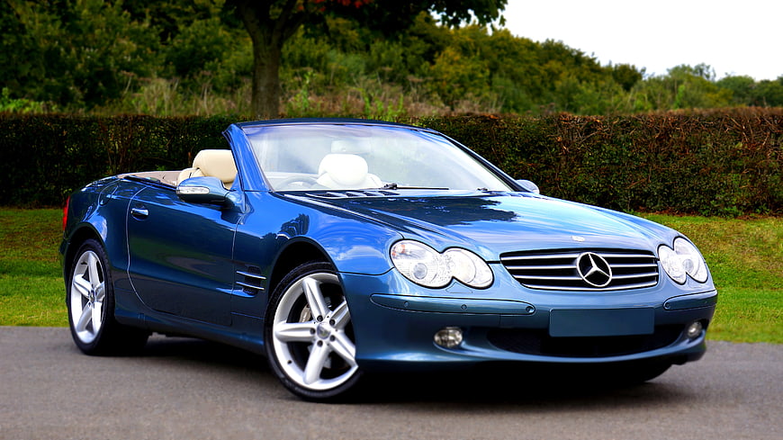 Blue Mercedes-Benz SL Convertible Parked on Road