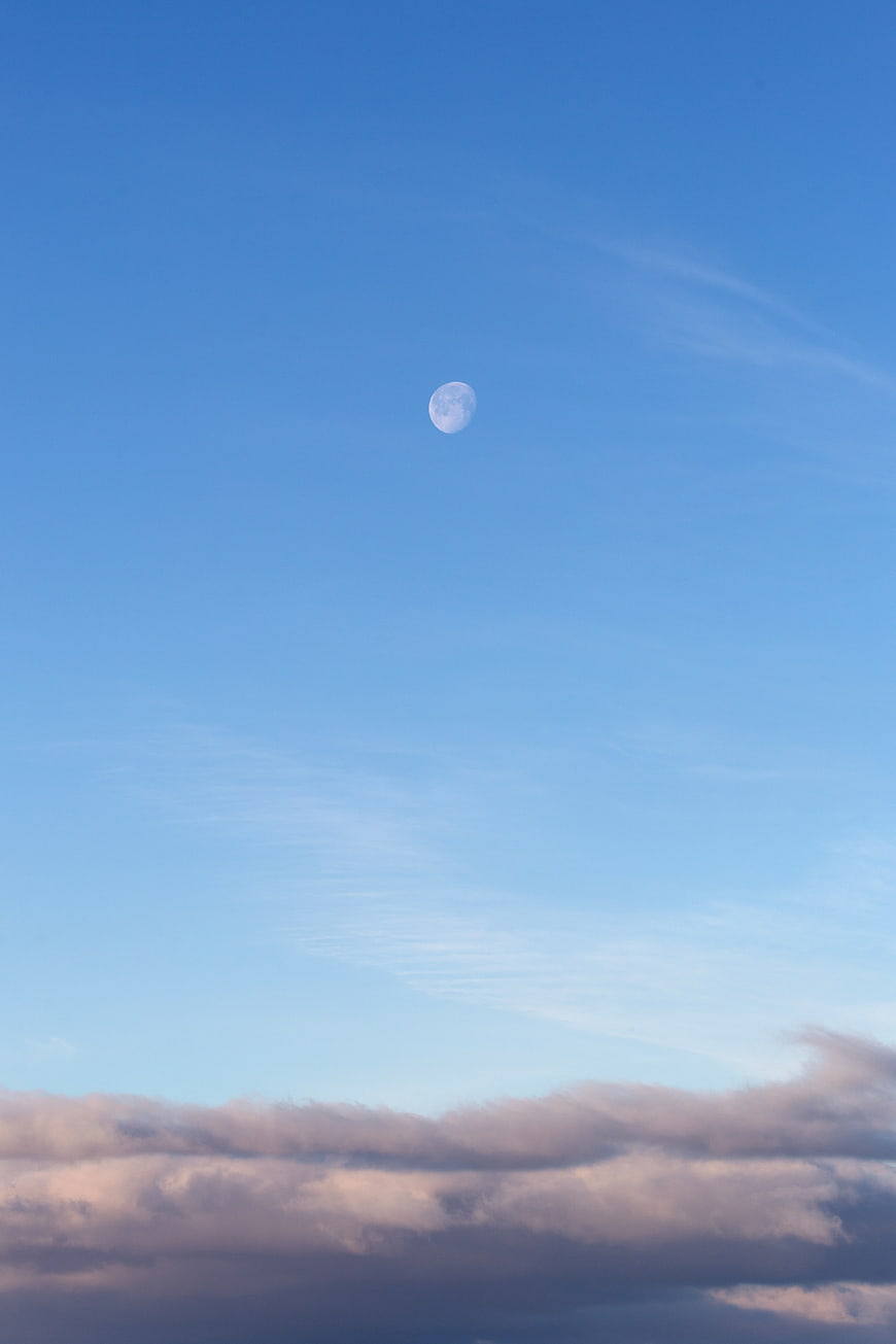 Full Moon in Blue Sky with Pink Clouds